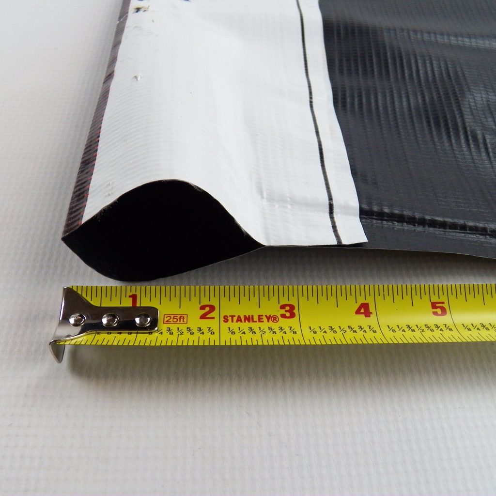 Reused Billboard Vinyl 1316oz, Black, With Pipe Sleeves Click for